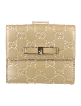 Gucci GG Signature Leather Compact Wallet