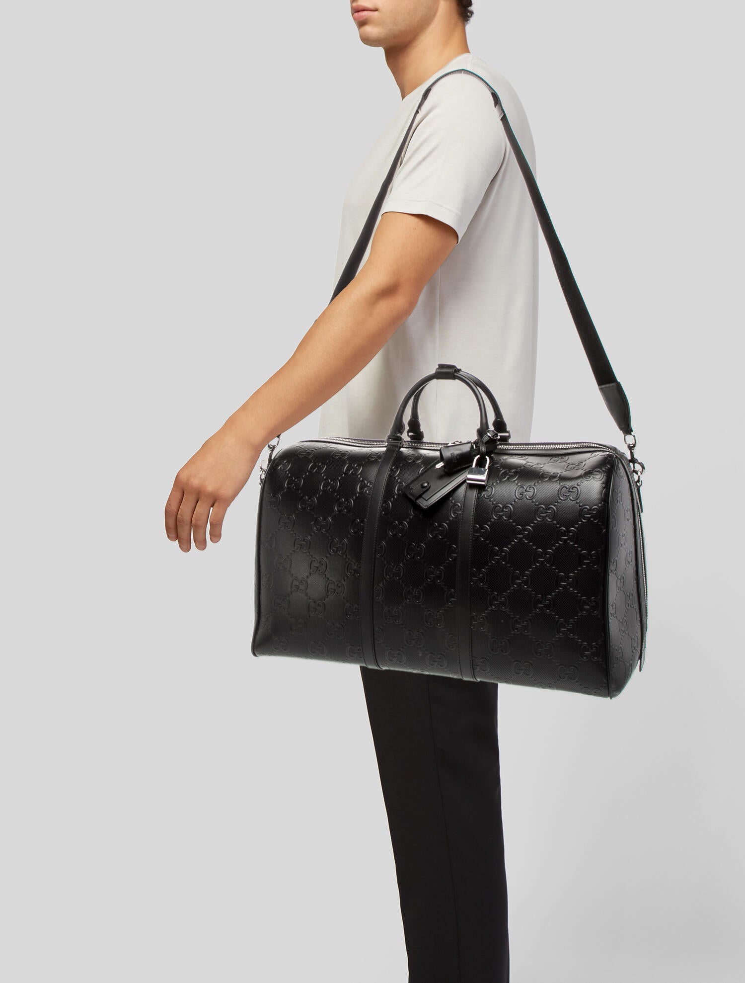 Gucci Large GG Embossed Leather Duffle Bag