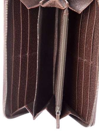 Gucci Bree Zip GG Canvas Wallet