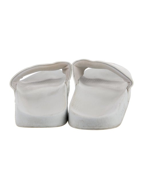 Gucci GG Embossed Leather Slides