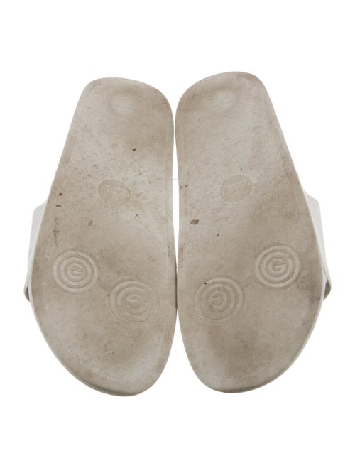 Gucci GG Embossed Leather Slides