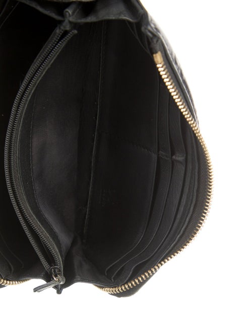 Gucci GG Signature Leather Wallet