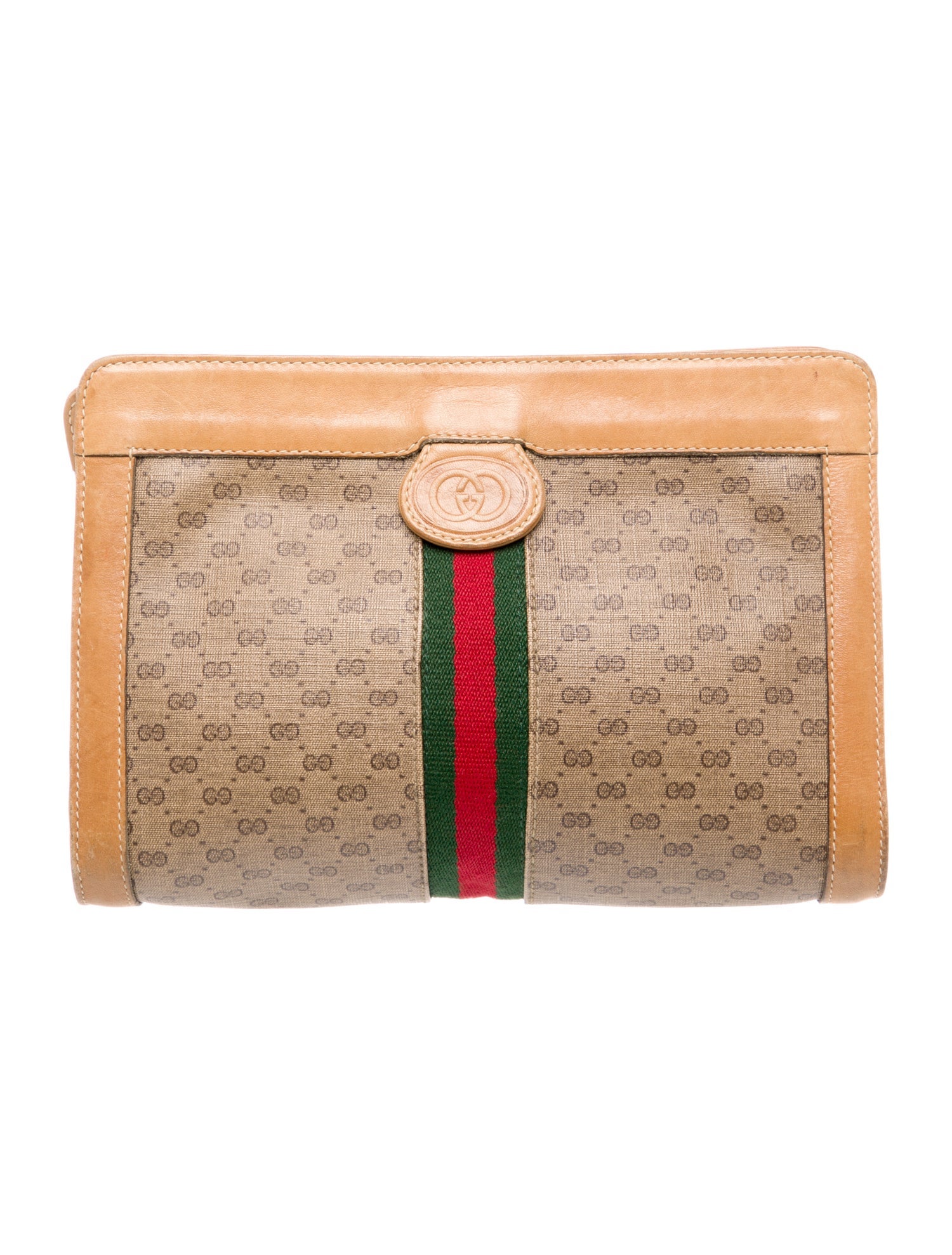 Gucci brown patterned cosmetic bag.