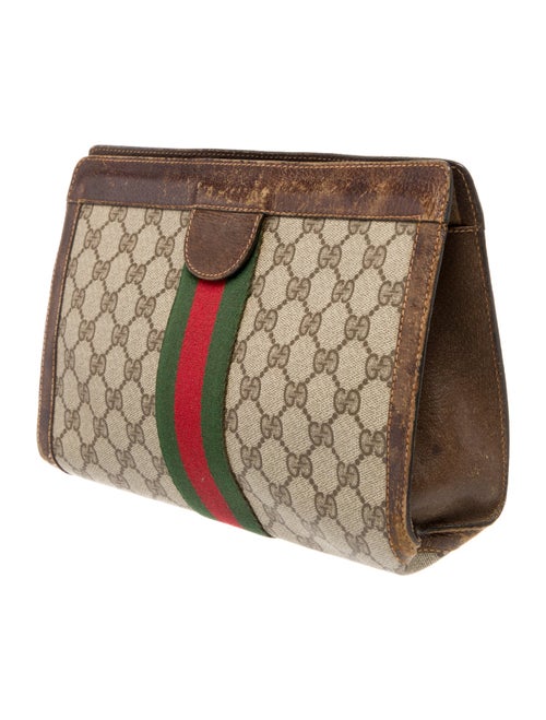 Gucci Brown patterned cosmetic bag