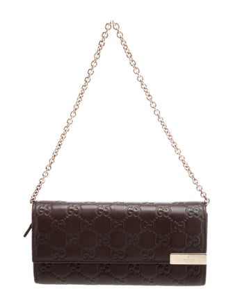 Gucci GG Signature Embossed Leather Wristlet