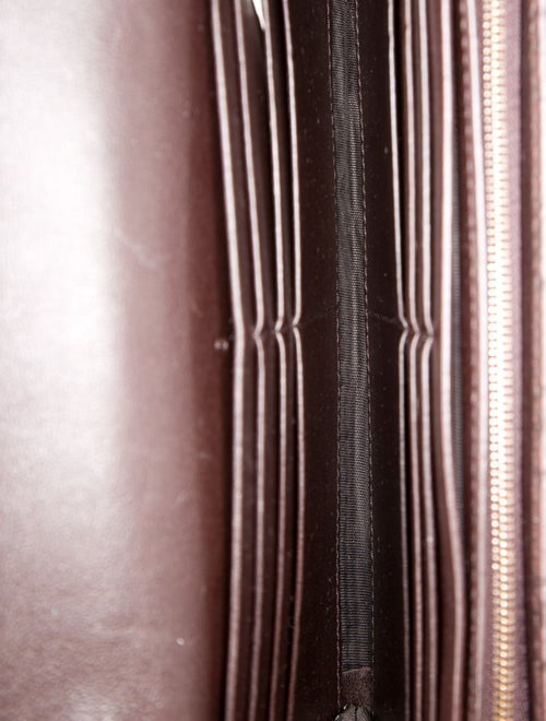 Gucci GG Signature Embossed Leather Wristlet