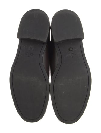 Gucci GG Signature Leather Riding Boots