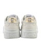 Gucci GG Embossed Leather Sneakers