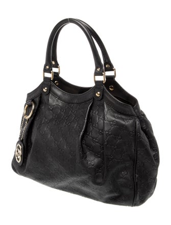 Gucci GG Signature Sukey