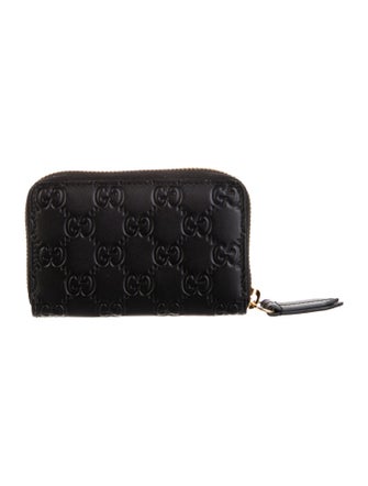 Gucci GG Signature Embossed Leather Wallet