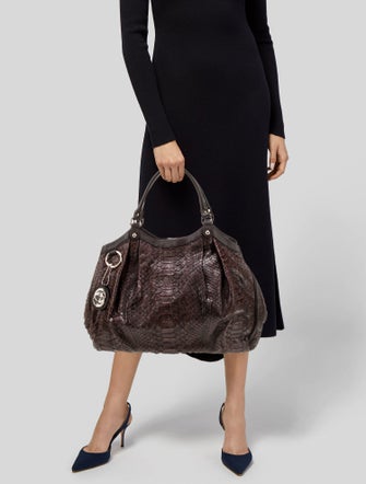 Gucci GG Signature Sukey