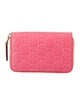 Gucci GG Signature Embossed Leather Compact Wallet