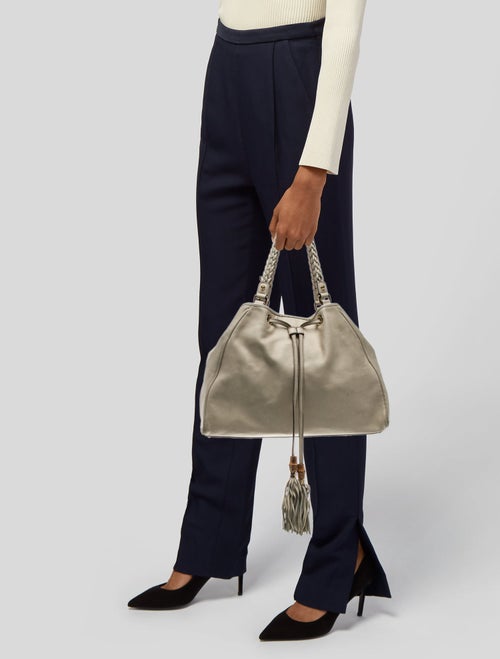 Gucci GG Signature Peggy