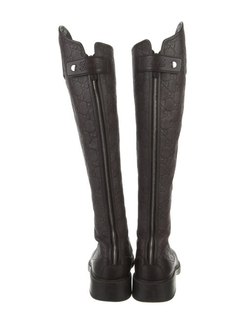 Gucci GG Embossed Leather Riding Boots