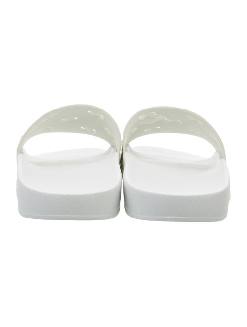 Gucci GG Signature Rubber Slides