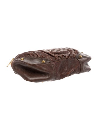 Gucci GG Embossed Jockey