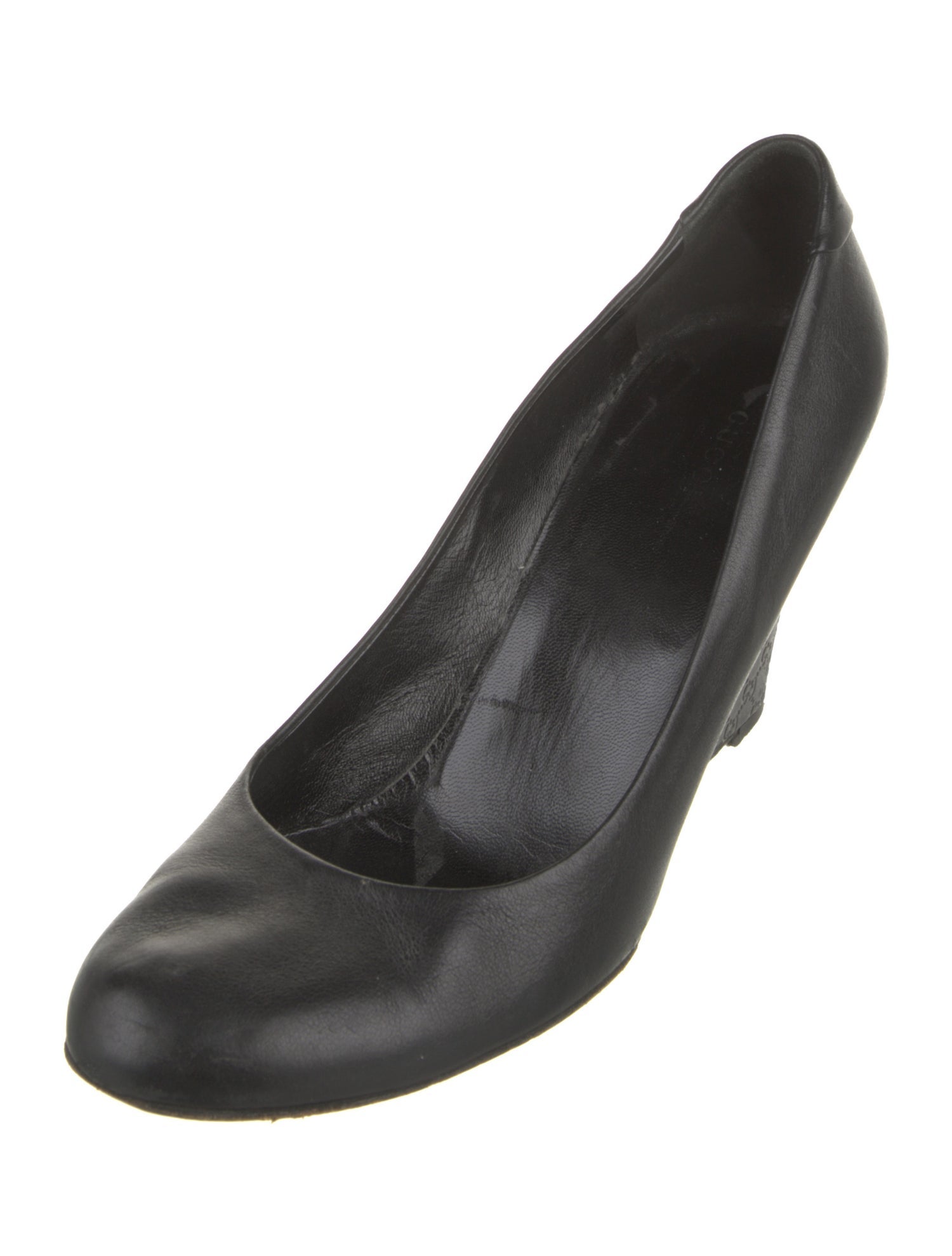 Gucci GG Signature Leather Pumps