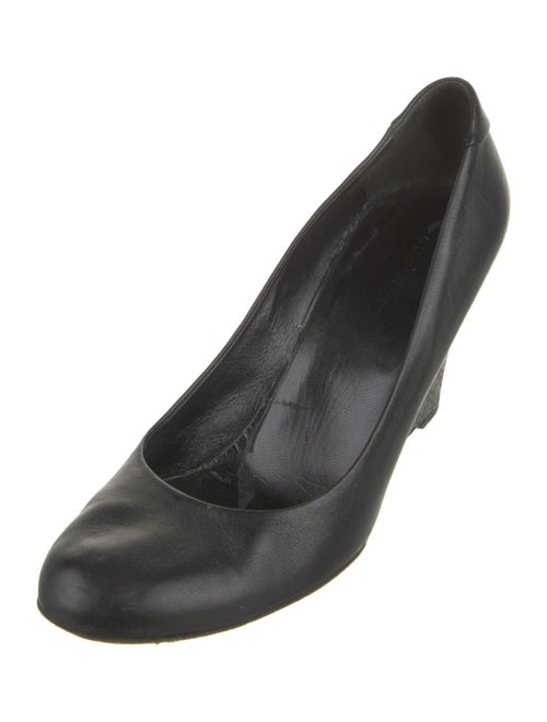 Gucci GG Signature Leather Pumps