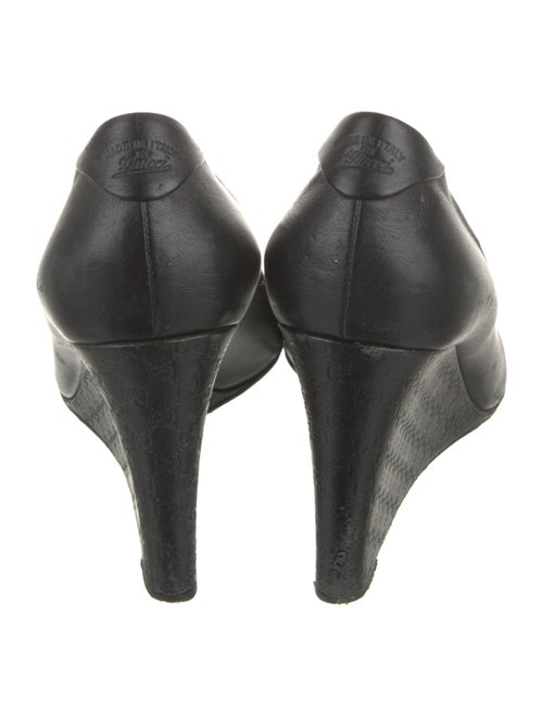 Gucci GG Signature Leather Pumps