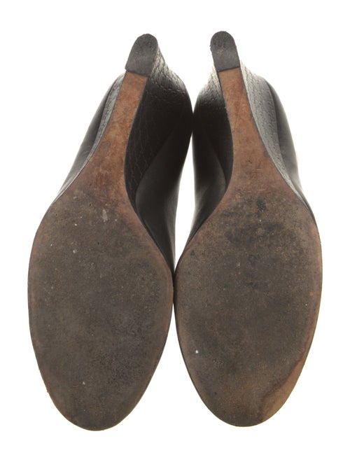 Gucci GG Signature Leather Pumps