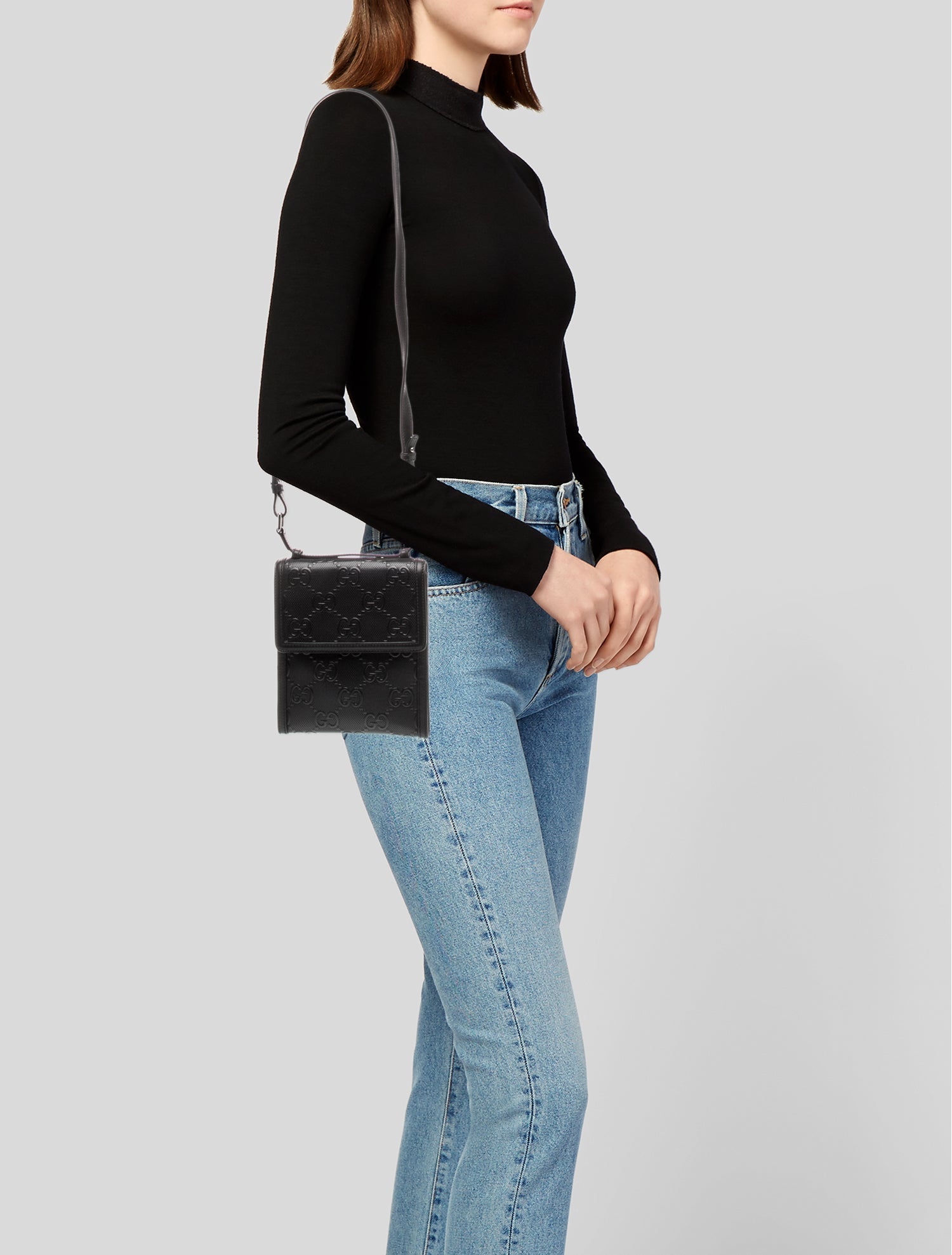 Gucci GG Embossed Top Handle Bag