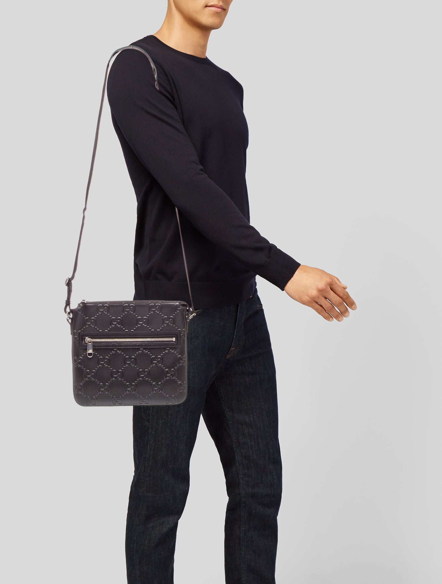 Gucci GG Embossed Messenger Bag
