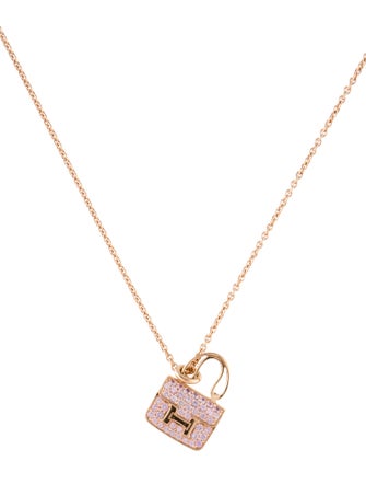 Hermès 18K Sapphire Amulettes Constance Pendant Necklace