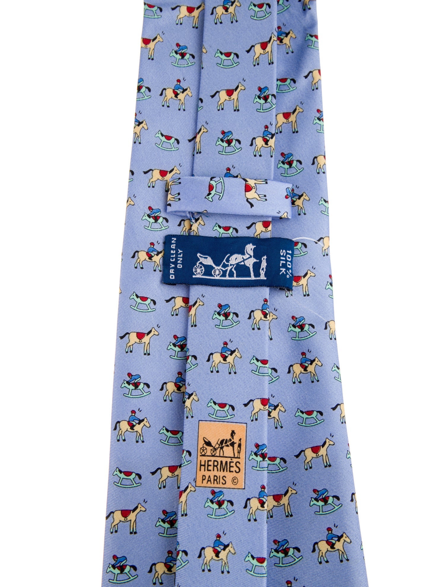 Hermès Silk tie with horse pattern print.
