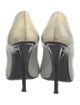 Jimmy Choo Snakeskin Pumps