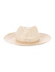 Janessa Leone Wide brim straw hat.