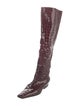 Khaite Patent Leather Animal Print Riding Boots