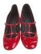 Khaite Patent Leather T-Strap Pumps