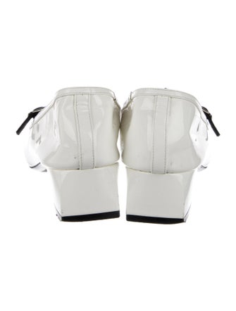 Khaite Patent Leather Slingback Pumps