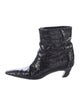 Khaite Embossed Leather Animal Print Lace-Up Boots