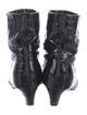 Khaite Embossed Leather Animal Print Lace-Up Boots