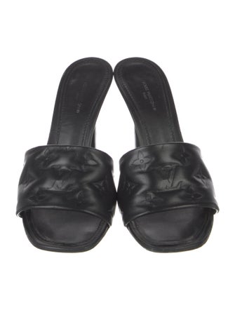 Louis Vuitton LV Monogram Embossed Leather Slides