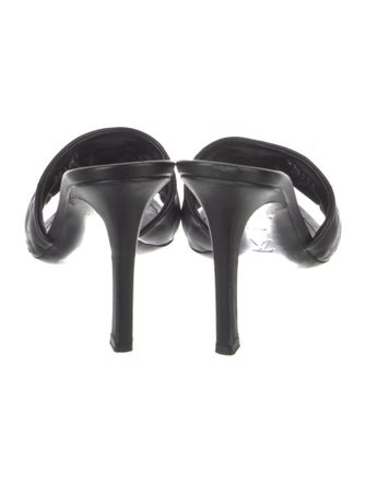 Louis Vuitton LV Monogram Embossed Leather Slides