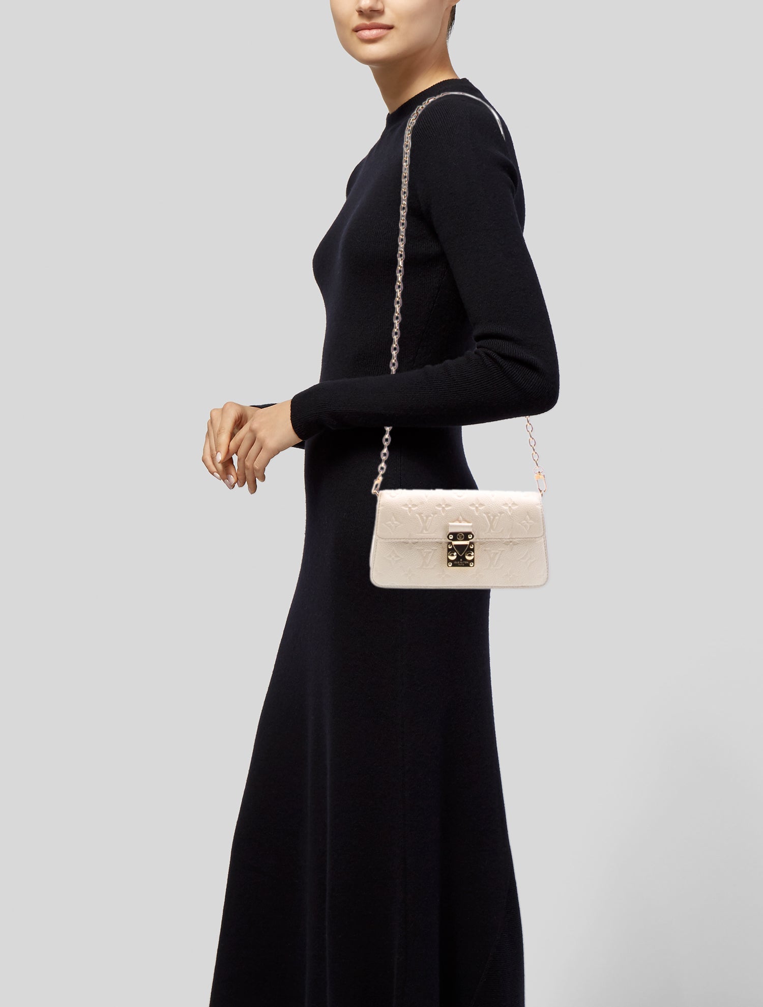 Louis Vuitton Leather Clutch