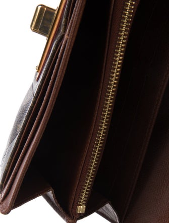 Louis Vuitton 2010 Monogram Pattern Etoile Sarah Wallet