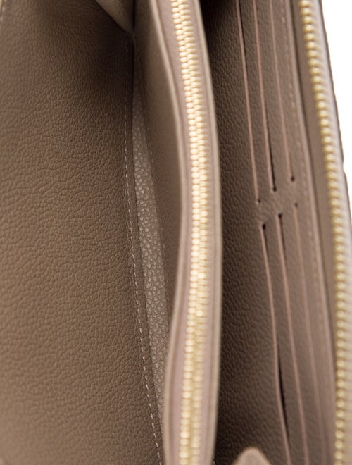 Louis Vuitton LV Monogram Empreinte Leather Zippy Wallet