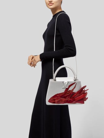 Louis Vuitton Leather Floating Fish Capucines MM