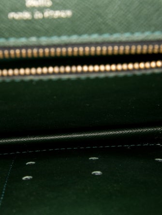 Louis Vuitton Taiga Leather Pochette Kourad