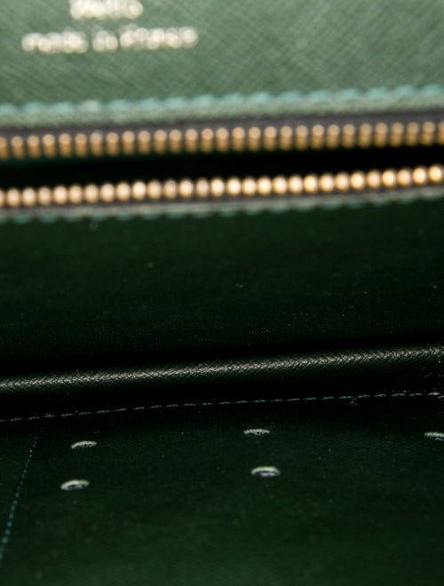 Louis Vuitton Taiga Leather Pochette Kourad