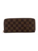 Louis Vuitton Damier Ebene Pattern Coated Canvas Zippy Wallet
