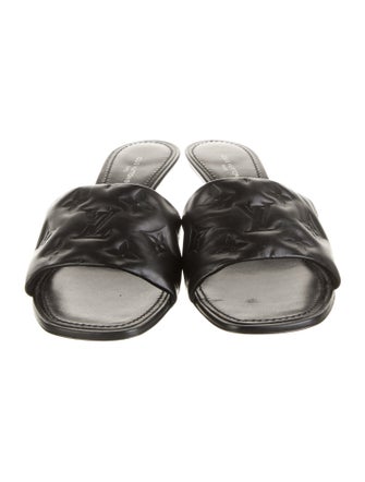 Louis Vuitton LV Monogram Embossed Leather Slides