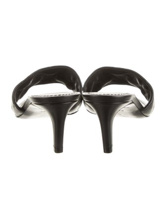 Louis Vuitton LV Monogram Embossed Leather Slides