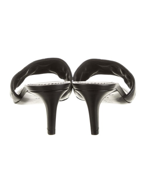 Louis Vuitton LV Monogram Embossed Leather Slides