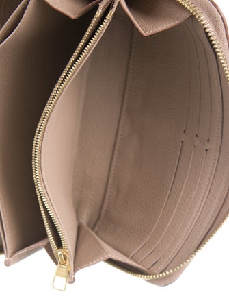 Louis Vuitton LV Monogram Empreinte Leather Zippy Wallet