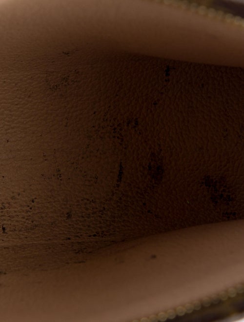 Louis Vuitton Monogram Toiletry Pouch.