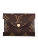 Louis Vuitton LV Monogram Coated Canvas Kirigami Pochette PM